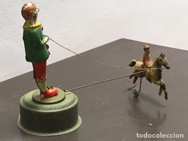 Juguete de hojalata payaso 